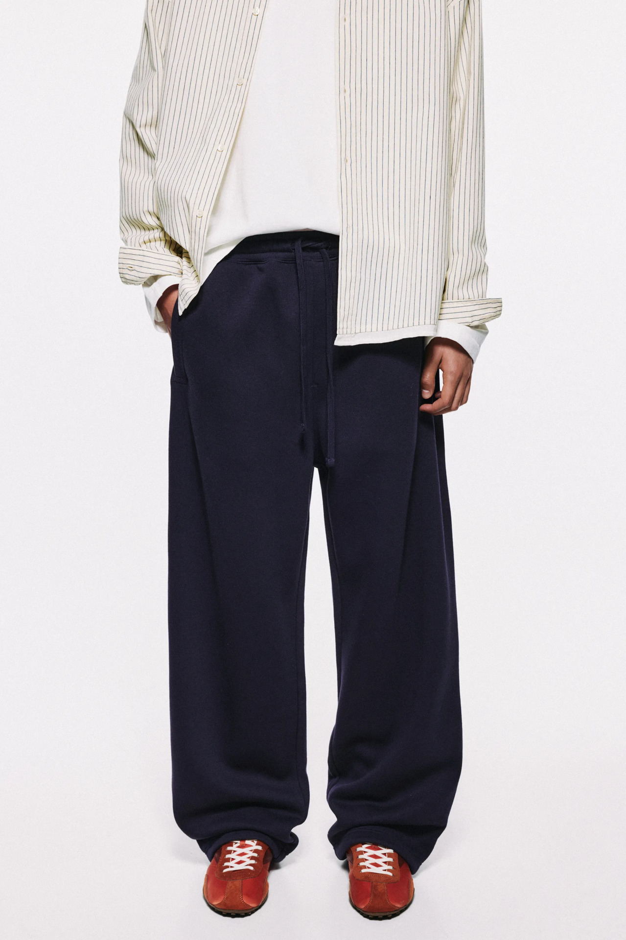  شلوار اسلش بگی مردانه سرمه‌ای با دمپای قابل تنظیم برند Pull&Bear | بادابینگ استایل 